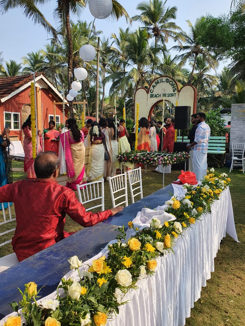 Guests at a wedding reception in the resort garden
